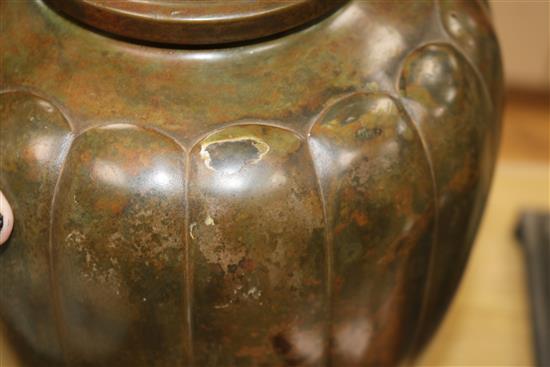 A Japanese Meiji period bronze vase, of lobed ovoid form, height 25.5cm